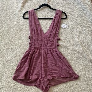 Windsor Dusty Pink Romper with a Low Neckline, Low Back, and Open Sides